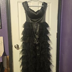 Elegant Black Romper With Ruffled Skirt